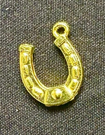 Gold horse shoe
