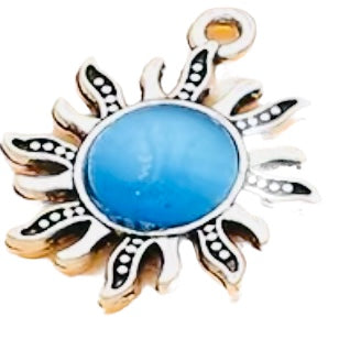 Light blue center silver plated sun with lobster clasp